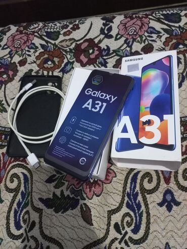 Samsung: Samsung Galaxy A31, 64 GB, rəng - Mavi, Barmaq izi, Face ID