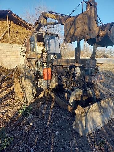 Ekskavatorlar: Ekskavator-yükleyici (traktor bazalı) – ön bıçaq və arxa ekskavator — 8