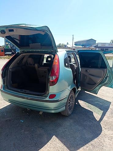 ключ звездочка: Nissan Tino: 2000 г., 2 л, Вариатор, Газ, Минивэн — 8