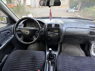 фиат уно: Mazda Familia: 2000 г., Бензин, Универсал — 7