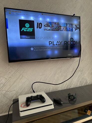 Video oyunlar üçün aksesuarlar: PS4 slim satılır, 1 TB yaddaşı var, problemsizdir, oyunlarla birlikdə