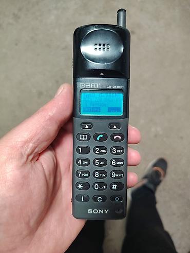 igrice gta: Sony GSM CM-DX1000 mobilni telefon (retro), ima kutiju, punjač, fu — 1