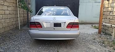 mercedes 180 b: Mercedes-Benz E-Class: 2.4 l | 1999 il Sedan — 6