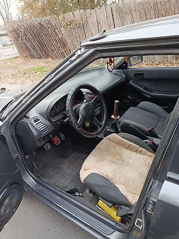 дрифт кар бу: Mazda 323: 1991 г., 1.8 л, Механика, Бензин, Хэтчбэк — 5