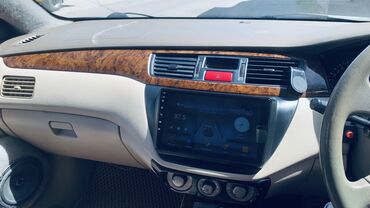 электромобиль neta: Мини-тракторы Mitsubishi Lancer: 2000 г., 1.5 л, Автомат, Бензин, Седан