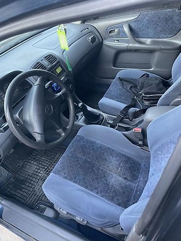 машинка б у: Mazda 323: 1999 г., 1.6 л, Механика, Бензин, Седан — 3