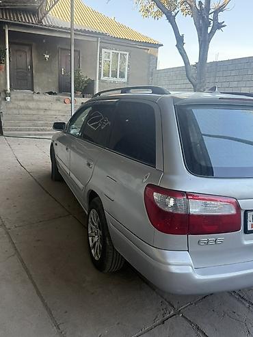 q 7: Mazda 626: 2001 г., 2 л, Механика, Бензин, Универсал — 5