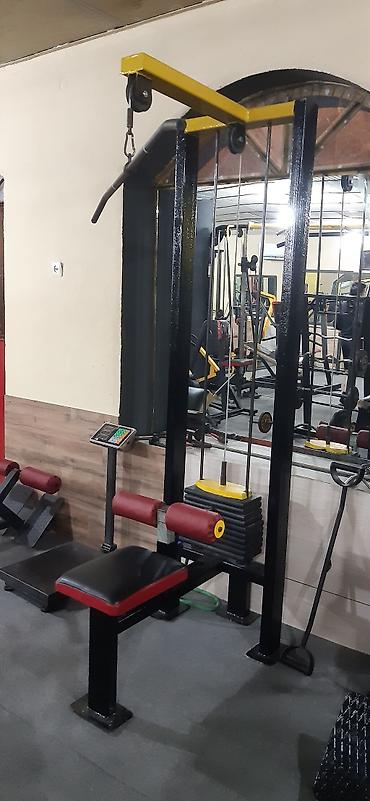 idman trenajorları: Şaquli dartma (lat pulldown) trenajoru - Arxa, lat, çiyin və qol — 1