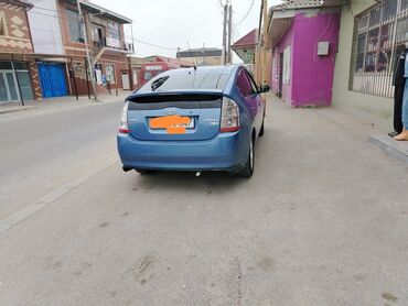 Toyota: Toyota Prius (2-ci nəsil) hibrid hetçbek,7 düyməyaxşı vəziyyətdədi — 4