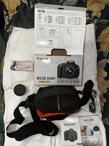 Фотоаппараты: Зеркальная камера Canon EOS 600D (Kit) Комплектация по фото: - Тушка — 14