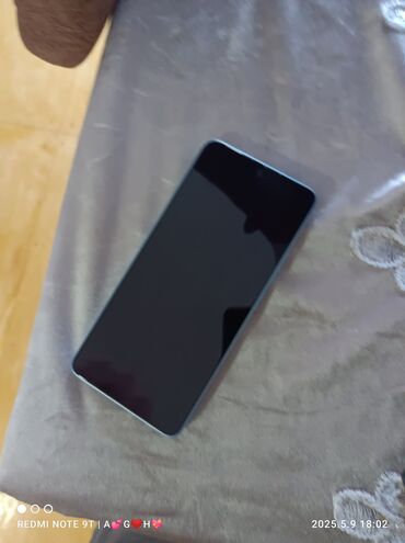telefon smartfon: Xiaomi Redmi 9T, rəng - Göy, 
 İki sim kartlı