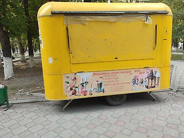 тынчтык ж м: Продаётся уличный торговый прицеп (фуд-киоск) ярко‑жёлтого цвета. цена — 2
