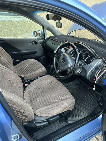 бюджетные электромобили: Honda Fit: 2003 г., Автомат, Бензин, Хэтчбэк — 6