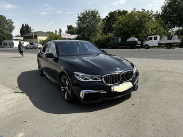 две машины: BMW 7 series: 2017 г., 4.4 л, Типтроник, Бензин, Седан