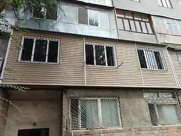 Утепление: Предлагается обшивка балкона, выполненная из сайдинга серого цвета — 5