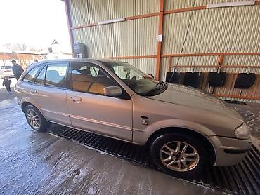 Mazda: Mazda Familia: 2004 г., 2 л, Механика, Дизель, Универсал — 7