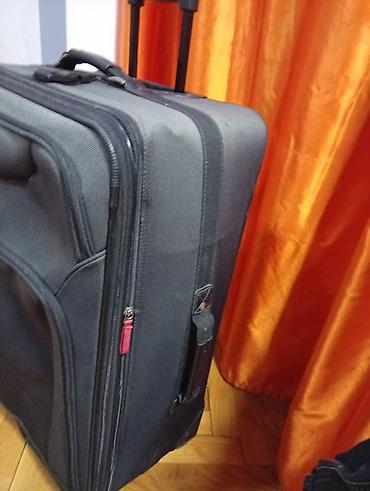 Putni koferi i torbe: Veliki kofer na točkiće – American Tourister. 75 45 30 - — 10