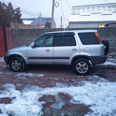коропка срв: Серебристый внедорожник Honda CR-V 1999 года выпуска. Автомобиль