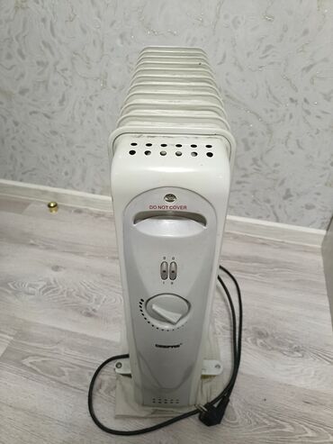 komur qizdiran: İsidici radiator. İwlekdir. Tekerleri yoxdur. Yagi var. Tecili