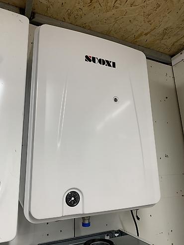 Газовый котёл Suoxi (настенный) Описание: - Компактный настенный