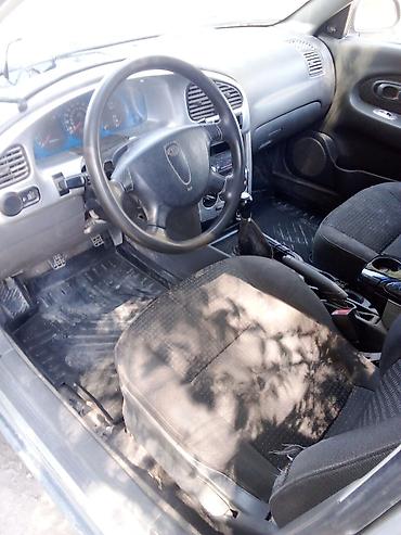 rox 01: Kia Spectra: 2003 г., Седан — 7