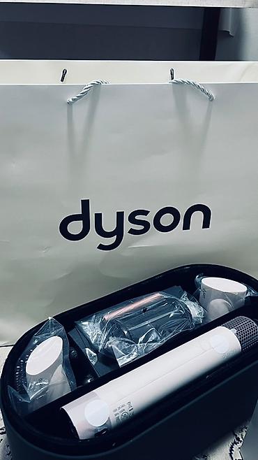 Фен-стайлер Dyson в фирменном кейсе и упаковке. Комплект предназначен