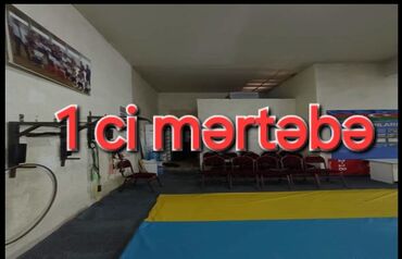 Binalar: Binə qəsəbəsində yerləşən “Vasaq” İdman Klubu və yanında ayrıca — 7