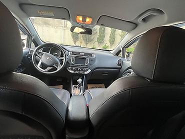 mini kia: Kia Pride: 1.4 l | 2015 il Sedan — 1