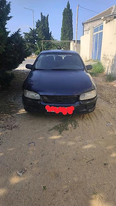Opel Astra F sedan (təxmini 1990‑cı illərin sonu) - Kuzov: 4 qapı