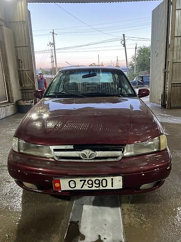 Унаа: Daewoo Nexia: 1999 г., Кол менен иштөөчү, Бензин, Седан — 1