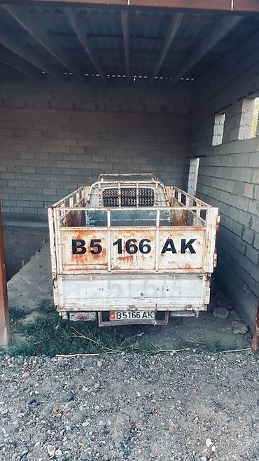 авто краны: Грузовой мини‑пикап Kia (двухрядная кабина) Описание: - Компактный — 4