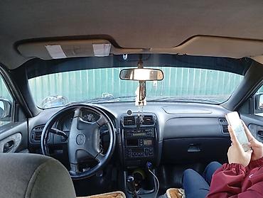 385 55: Mazda 626: 1998 г., Механика, Седан — 1