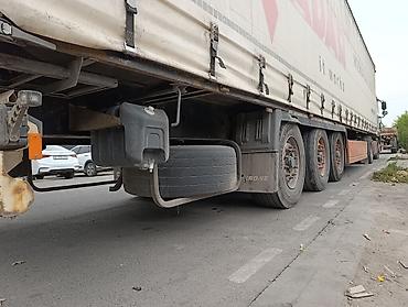 Прицепы и полуприцепы: Полуприцеп-тент KRONE (шторный) 2014год в хорошем состоянии бок — 3