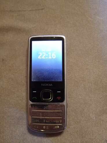 Nokia: Nokia 6700 Slide, rəng - Ağ, Düyməli