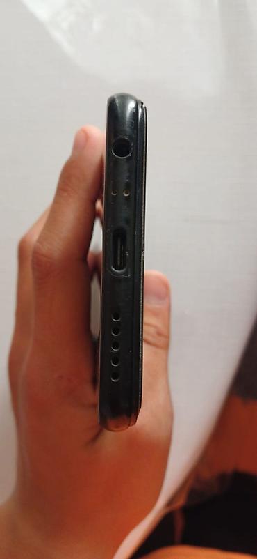 Mobil telefonlar: Xiaomi 64 GB, rəng - Qara, 
 Barmaq izi — 2
