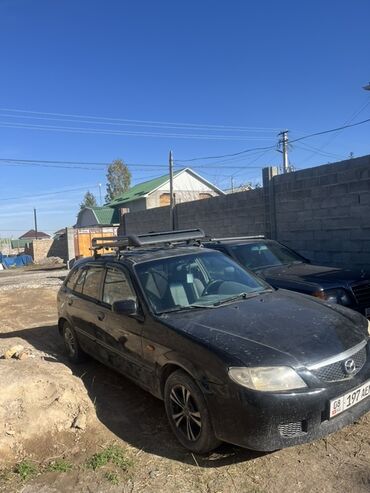 мазда демио продаю: Mazda 323: 2001 г., 1.6 л, Механика, Бензин, Хетчбек