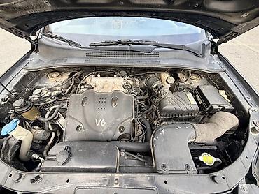 Kia: Kia Sportage: 2.7 l | 2008 il Krossover — 14