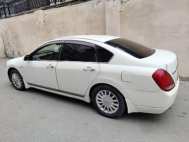 nissan teana 2000: Nissan Teana – ağ rəngli, geniş salonlu biznes-seqment sedan. Texniki — 3