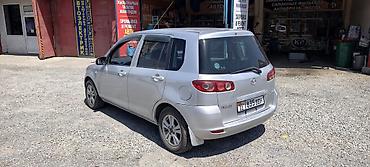 росрочка афто: Mazda Demio: 2003 г., Автомат, Бензин — 4