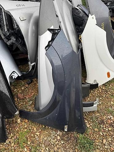 auto delovi kovin: LEVO KRILO OPEL ASTRA H | Levi krilo opel astra h — 1