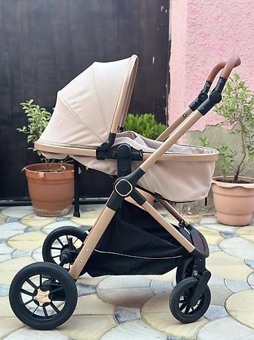 Kidilo brendinə məxsus Uşaq arabası – bej rəng, qızılı çərçivə və dəri lalafo.az -da Kidilo brendinə məxsus Uşaq arabası – bej rəng, qızılı çərçivə və dəri