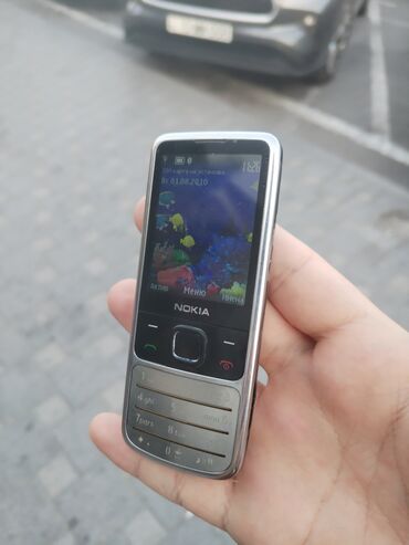 telefonu nokia 6700 telefonu al: Nokia 6700 Slide, 16 GB, rəng - Qara, Düyməli, Barmaq izi, Simsiz şarj