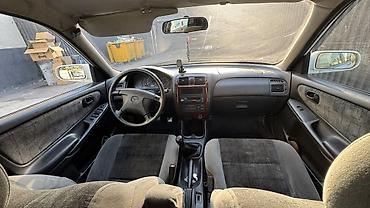 мото зонтик: Mazda Capella: 1999 г., Универсал — 7