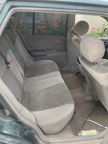 стёк: Mazda 626: 2000 г., 2 л, Механика, Бензин, Универсал — 1