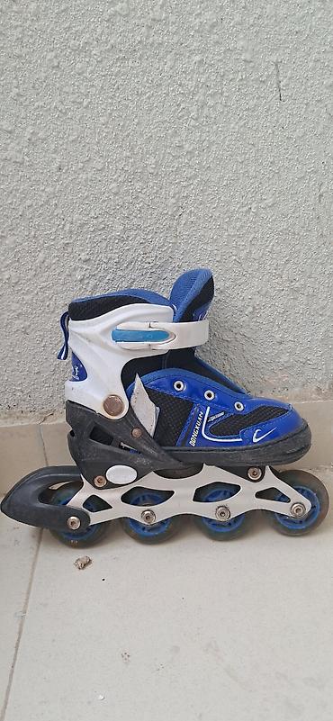 İdman və istirahət: Uşaq üçün tənzimlənən inlayn konki (roller) - Rəng: mavi-ağ-qara - — 4