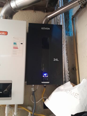 GÜVEN qara rəngli su qızdırıcısı. 24 litr.sensorludu.teze