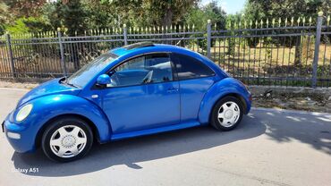 радиатор на пассат: Синий автомобиль Volkswagen Beetle с характерным обтекаемым силуэтом