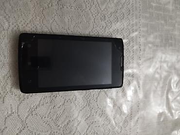 kohnə telefon: Lenovo A1000, rəng - Qara, Sensor — 1