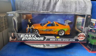 Avtomobil modelləri: Коллекционная модель Toyota Supra A80 Orange 1995 Jada Toys Art