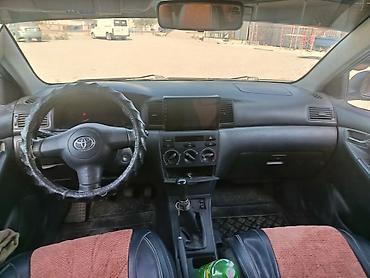 рул: Toyota Corolla: 2005 г., 1.6 л, Кол менен иштөөчү, Бензин, Седан — 2